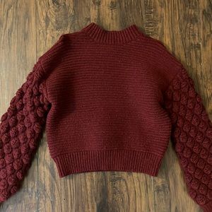 small burgundy sweater